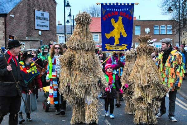 Traditional Whittlesey Straw Bear Festival celebration in the town streets.